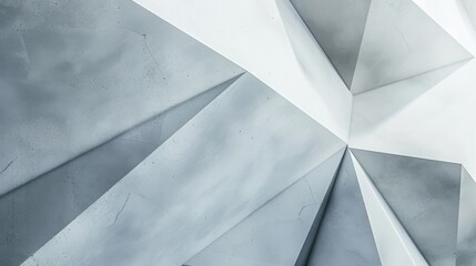 A photograph of an abstract geometric triangle pattern, taken from a slightly elevated angle, against a neutral background