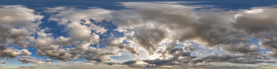 Obraz premium cloudy blue evening sky 360 hdri panorama with zenith and beautiful clouds before sunset for use in 3d graphics as sky dome or edit drone shot as sky replacement