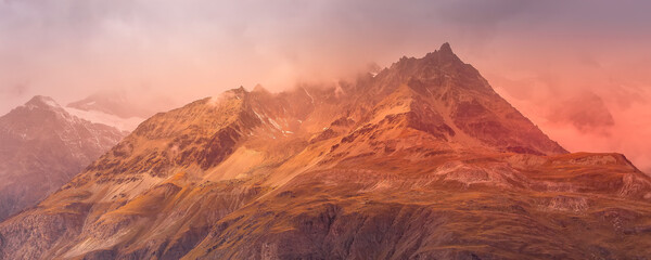 Swiss Alps in Switzerland dramatic sunset