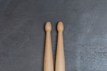 Drum sticks on a gray concrete surface