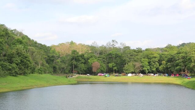 Camping zone alongside the lake at Namtok Samlan National Park in Saraburi Thailand