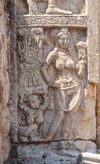 Carving of women on Jethawanaramaya Stupa, UNESCO World Heritage City, Anuradhapura, Sri Lanka