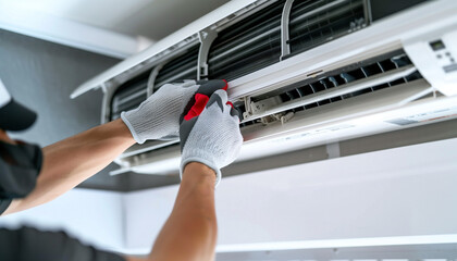Expert Technician Cleaning Air Conditioner with Gloves - Close Up Shot Against White Ceiling Background