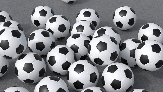 Soccer balls on gray floor