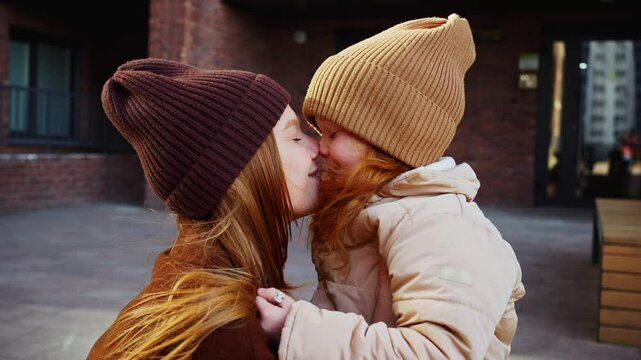 Mother and Daughter Sharing a Tender Moment in Spring