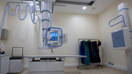 Radiation room for patient analysis and evaluation. X-ray machine in hospital. Diagnostic medical radiation equipment. Medical radiation equipment.
