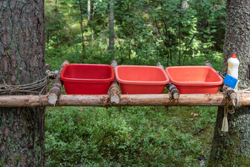 Scout patents. Three containers for washing or taking turns washing dishes in tourist or scout camp. Makeshift masts. Ropes and Knots. 