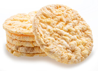 Puffed corn cakes or rice cakes isolated on white. Alternative snack for bread product.