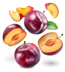 Ripe chinese plums and plum slices levitating in air on white background.