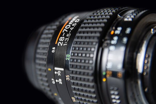 Black Digital Camera Lens  Close Up On Black Background