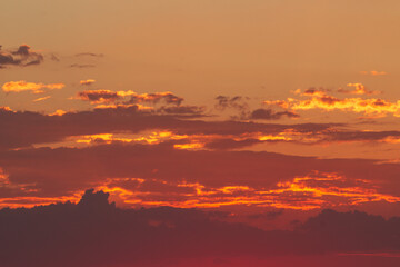 bright red sunset as background.