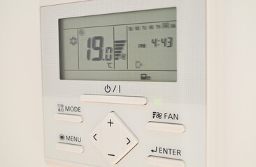 A wall-mounted air conditioner device paired with a remote control provides efficient cooling for...