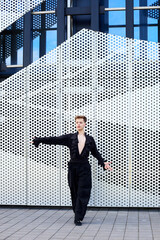 Athletic male dancer performs individual choreography