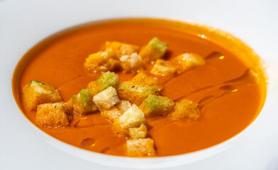 Creamy tomato soup or bisque with croutons, delicious rich smooth texture, perfect healthy lunch