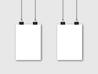 White blank posters hanging on binders. A4 paper page, with realistic shadow sheet on wall. Vector mockup