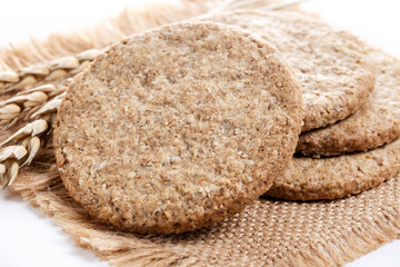 Healthy oatmeal cookies isolated on white background. Close up