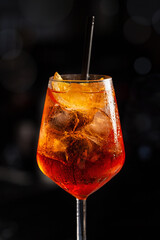 Close up of cold drink, italian spritz, wine-based cocktail, consists of Prosecco wine, digestive...