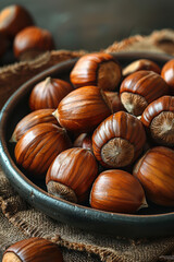 Obraz premium Roasted Chestnuts on Rustic Brown Background
