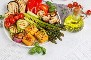 Assorted grilled vegetables on a plate, showcasing a colorful and healthy meal