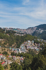 Houses perched on the hills at Shimla, India, Asia. View of the city.