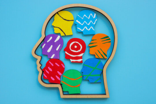 Neurodiversity or autism concept. Head outline with colors inside.