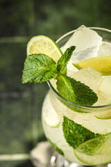 mojito with lime on a dark background