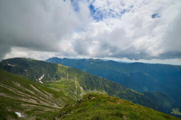Landscape with the Fagarasi mountains in Romania on a summer day.