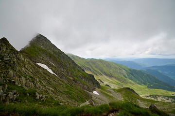 Landscape with the Fagarasi mountains in Romania on a summer day.