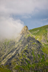 Landscape with the Fagarasi mountains in Romania on a summer day.