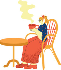Girl Sitting in a chair at a table and drink tea