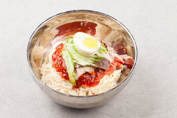  A food made by boiling ingredients such as onions and peppers, then pouring the cooled soy sauce over prepared crabs several times and allowing them to age.