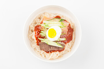  A food made by boiling ingredients such as onions and peppers, then pouring the cooled soy sauce over prepared crabs several times and allowing them to age.