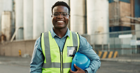 Industrial, outdoor and black man with portrait at construction site for maintenance, building repairs or project development. Engineer, safety and employee for confidence, infrastructure or labour