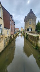 canal with building lining the banks