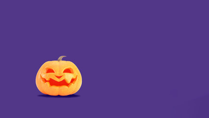 Jack o lantern Halloween background. Halloween pumpkin smiles on purple backdrop with copy space.