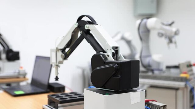 Laboratory test robots in the classroom for system testing and precision usability research : classroom that teaches the robotics industry.