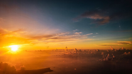 Stunning Sunset Above the Clouds