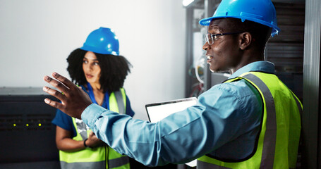 Team, engineer and hardware maintenance in server room for system inspection, update or network on...