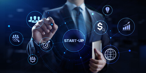 Startup new business idea. Businessman pressing button on screen.