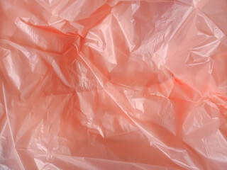 Fototapeta premium Old rose colored plastic bag texture for abstract background. 