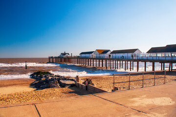 Southwold pier on a sunny afternoon with clear blue sky