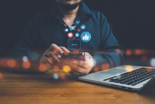 Social media and digital online concept, man using smart phone. The concept of living on vacation and playing social media. Social Distancing ,Working From Home concept. Social media concept.