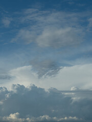 Blue sky. Beautiful Cumulus clouds flying across the sky,