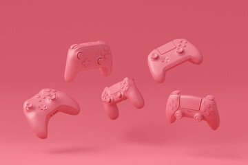 Set of flying gamer joysticks or gamepads on monochrome background