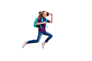 Full length side photo of little pupil jump high glad return school wear casual checkered shirt jeans denim isolated yellow background