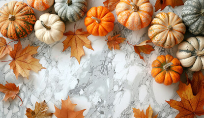 Fototapeta premium Autumn Elegance: Pumpkins and Leaves on Marble