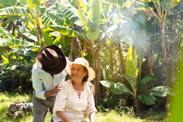 Lifestyle: elderly husband and wife outdoors enjoying a sunny day