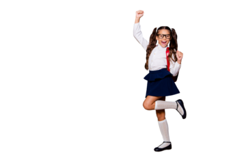 Full size body length of glad smart cute stylish small little girl with curly ponytails in white blouse shirt and blue skirt with red bag, celebrating. Isolated over black background