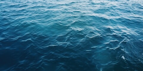 Fototapeta premium Ocean Waves Abstract, A dark blue sea with ripples