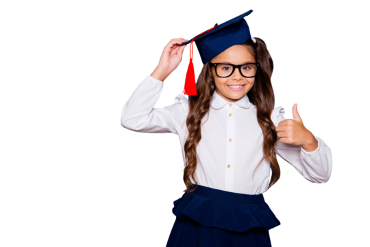 Choose great international education abroad! Positive glad nice adorable cute small little girl with curly ponytail in white shirt, skirt, master's hat, giving thumb-up. Isolated over black background